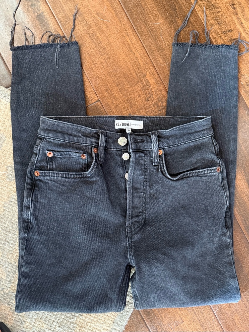 Re/Done High-Rise Black Button-Fly Raw Hem Jeans